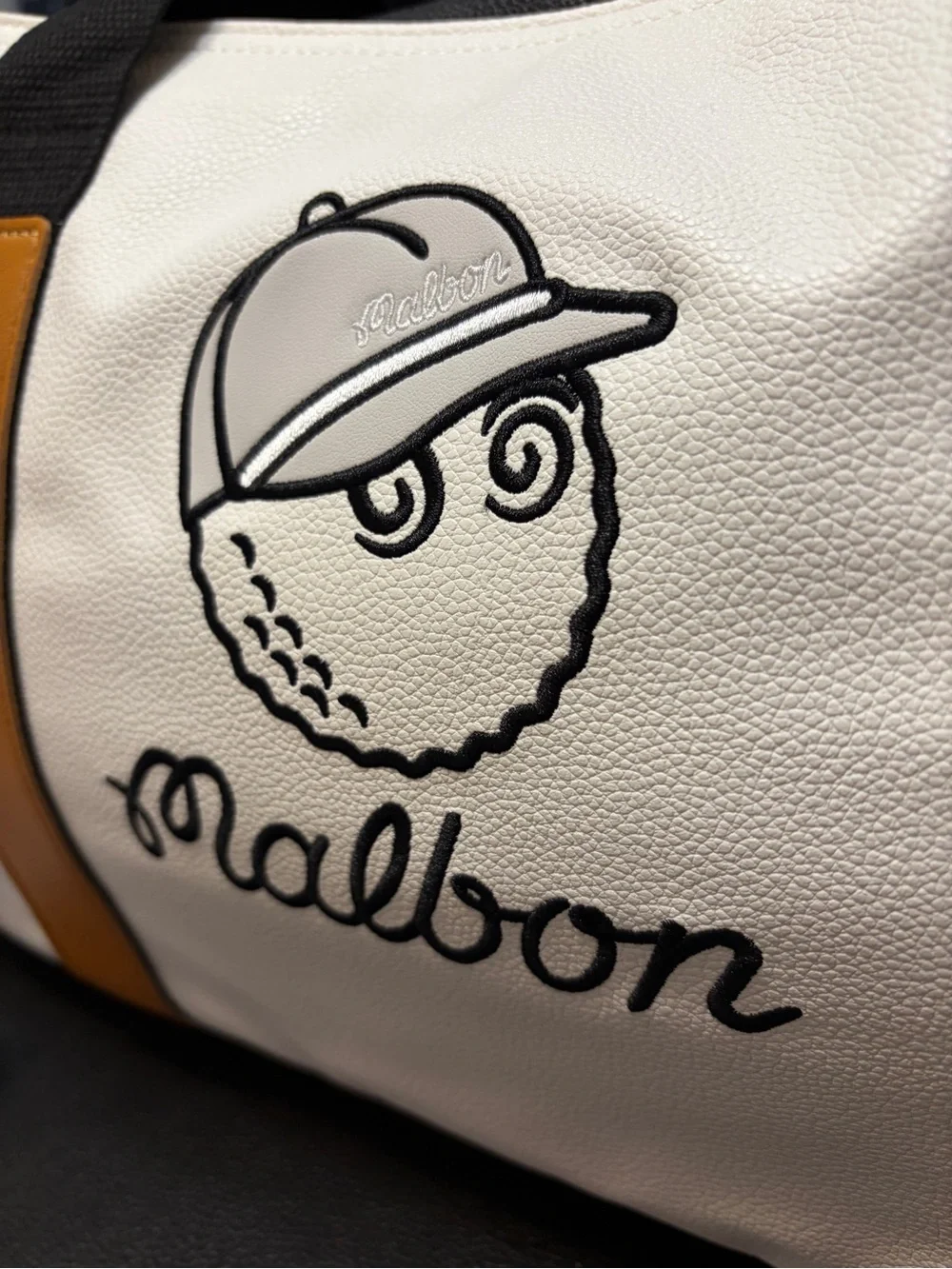 Malbon Duffel Bag Black, White, Brown.